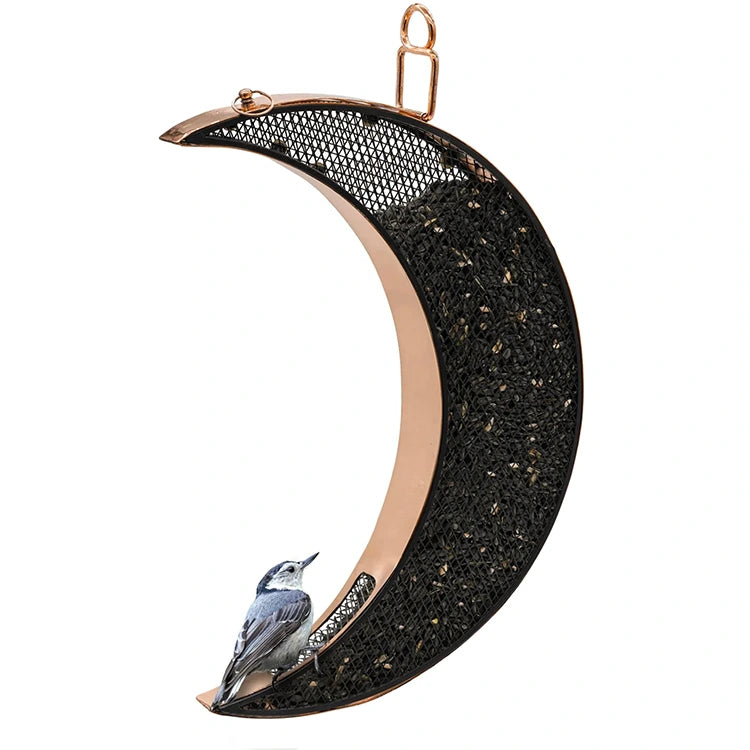 Crescent-shaped Over The Moon Copper Bird Feeder with mesh panels, featuring a perched songbird, perfect for easy birdwatching and outdoor durability.