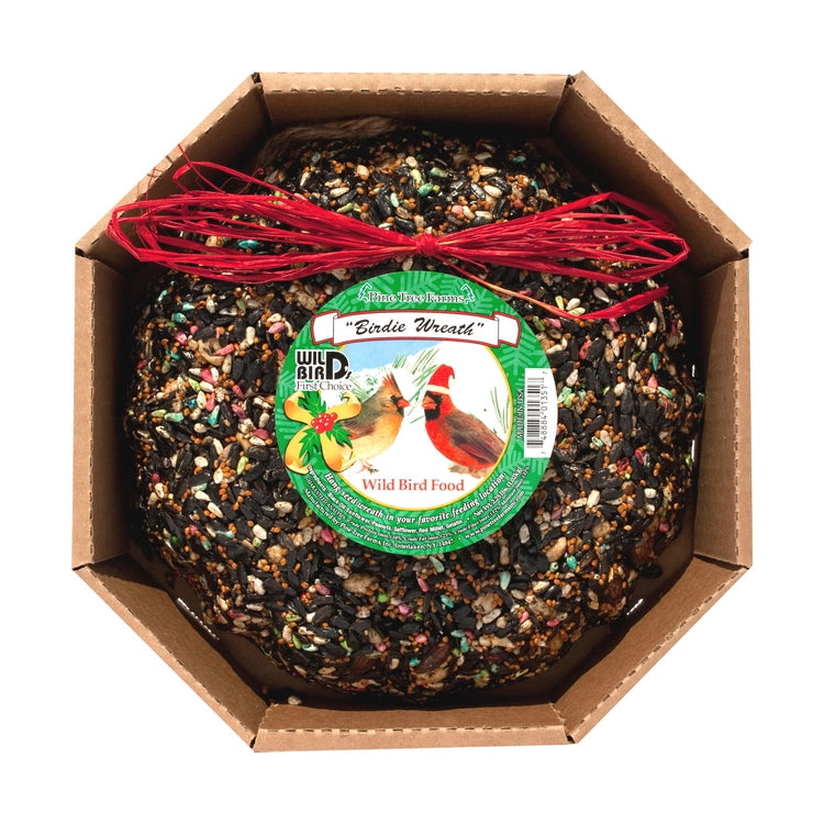 Pine Tree Farms Birdie Wreath wild bird seed wreath with decorative red raffia bow and cardinal label, displayed in its original cardboard packaging.