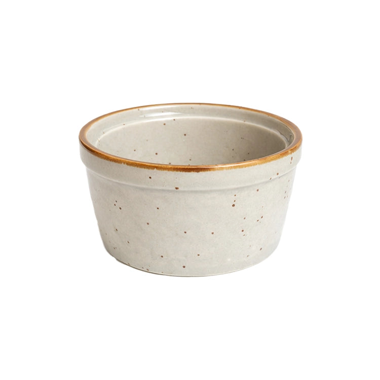 Duncraft 7 oz Azora Blue Porcelain Bird Feeding Cup, a small, round stoneware ramekin with a speckled off-white glaze and brown-trimmed rim for bird treats.