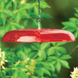 Duncraft Tilt-Top Squirrel Baffle, Red - Made in the USA, shown suspended with a chain, designed to tilt and deter squirrels from feeders.