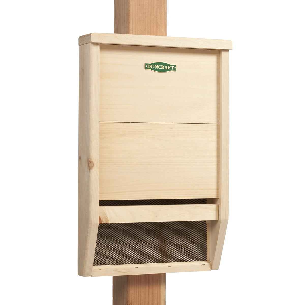 Duncraft BestBasic Bat House, a wooden box on a pole with black mesh screen, offers a roosting chamber for 30 bats, enhancing natural pest control.