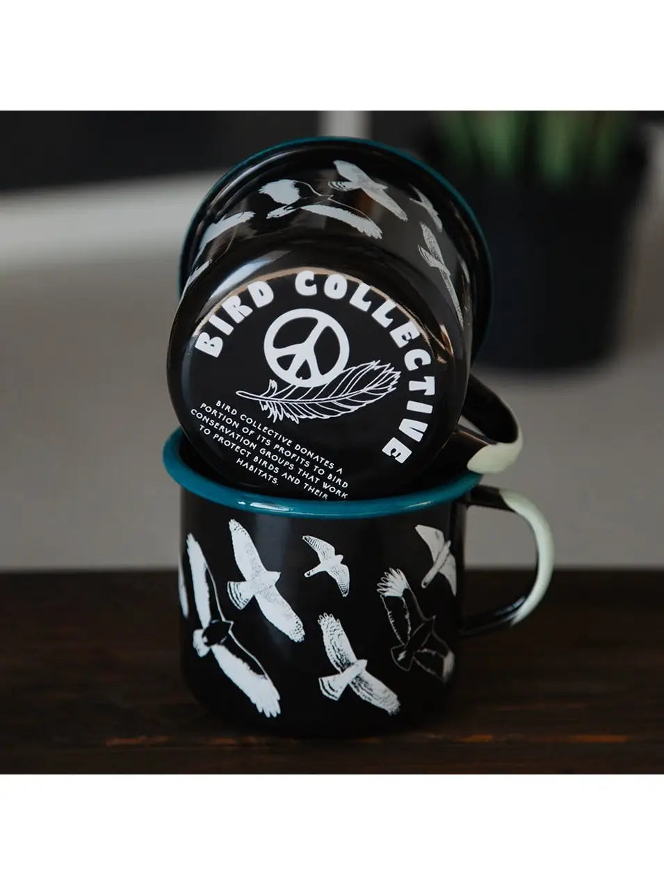 Hawks in Flight Large Enamelware Mug, featuring white raptors on a black background, stackable and handmade in Poland. Ideal for bird enthusiasts.