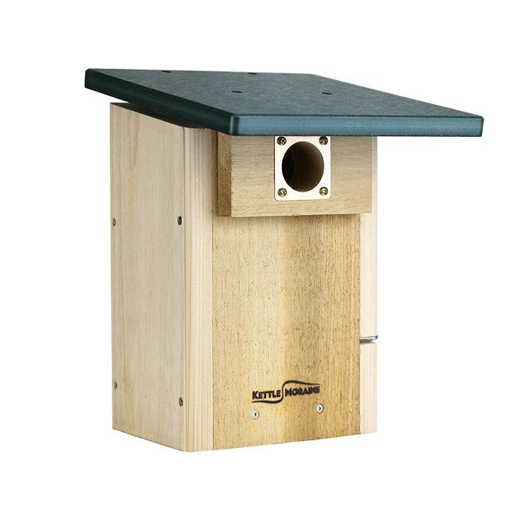 A Kettle Moilane wooden bird box with a natural light wood body, a dark green roof, and a metal entry hole, shown on a plain white background.