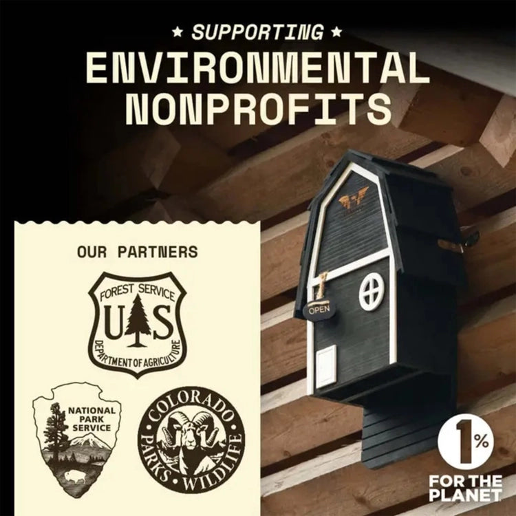 Big Bat Barn Junior mounted beneath wooden rafters with environmental conservation partner information