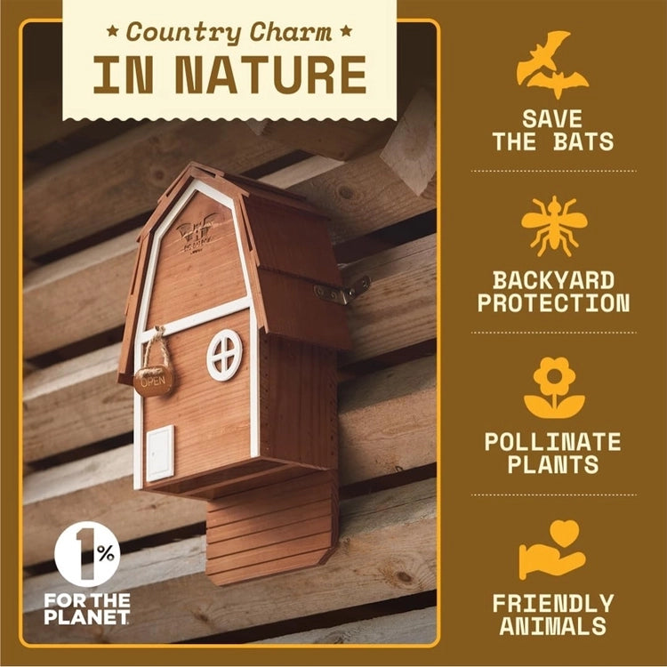 Brown cedar bat house mounted on a wooden building to provide sheltered roosting habitat for backyard bats