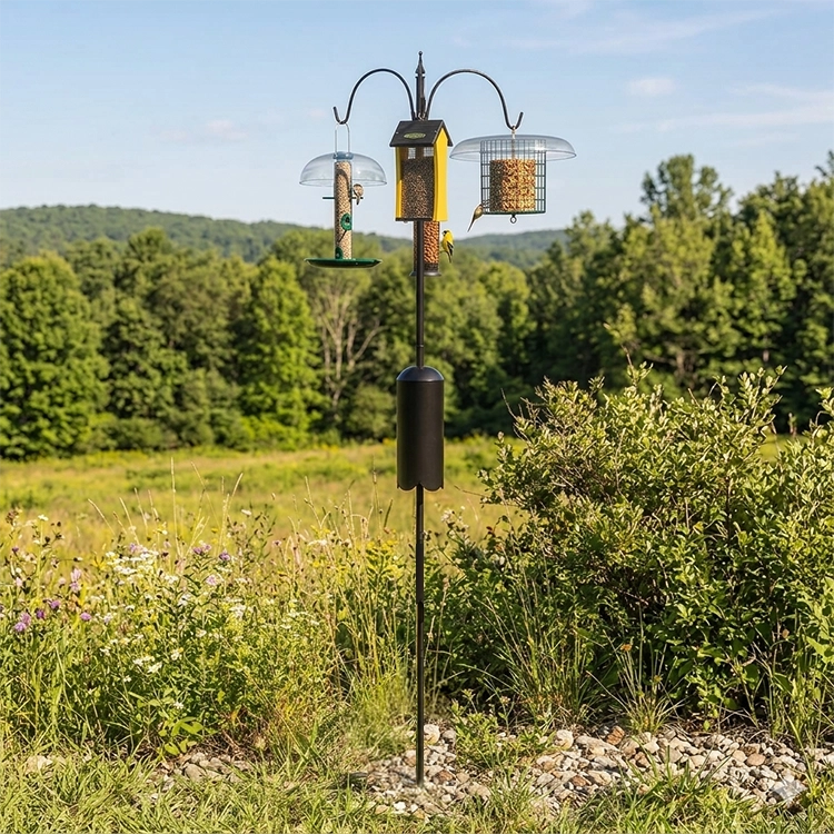 Squirrel-Proof Super Tall Quad Hanger featuring a three-arm pole with squirrel baffle, set in a grassy outdoor area, holds multiple bird feeders.