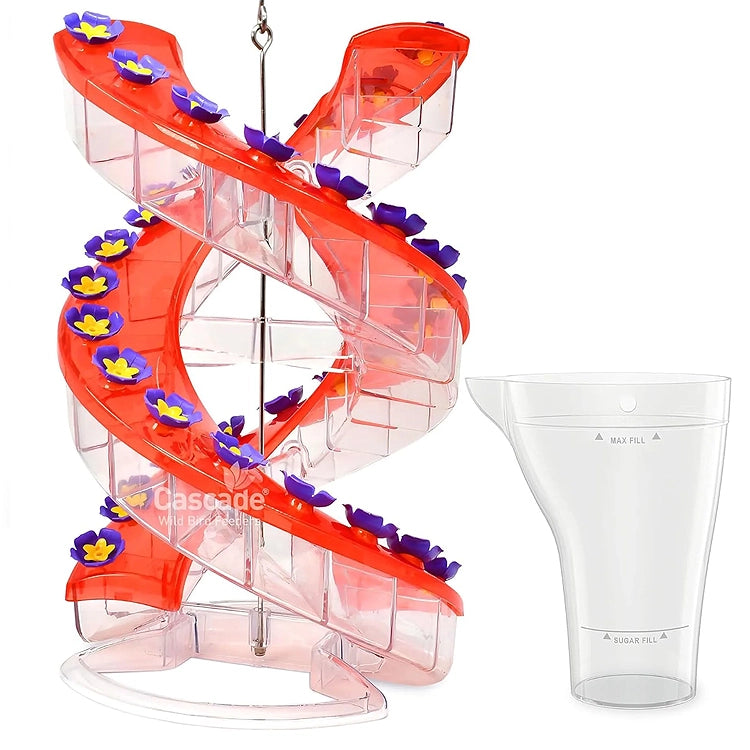 Spiral track toy with flowers and a clear container on a white background