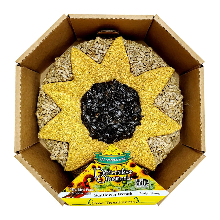 Sunflower Seed Wreath bird feeder, shaped like a sunflower with pressed seeds, packaged in an octagonal cardboard frame, featuring a natural jute hanger for easy display.
