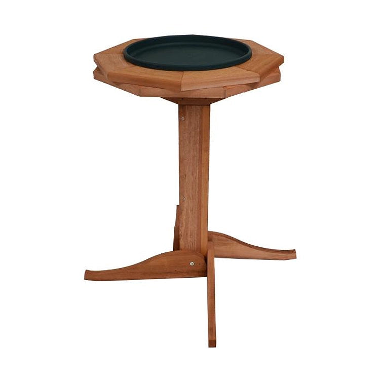 Western Red Cedar Heated Bird Bath with a wooden pedestal, black plastic tray, and thermostatically controlled heater, ideal for providing birds with water in cold weather.