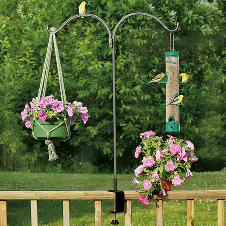 Double Arm Rail Bracket displaying bird feeders and flowers on a wooden deck railing with easy viewing and versatile hanging options.