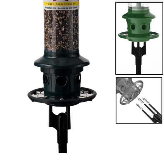 Brome Squirrel Buster Plus Pole Adapter, featuring a cylindrical tube with seeds, three prongs for stability, and a stainless steel mid-ring to prevent squirrel access.