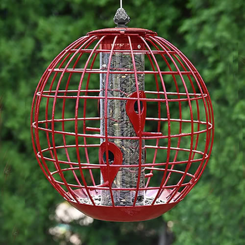 Round Squirrel Resistant Cage Seed Feeder in Dark Red, designed to attract small birds while keeping squirrels out, featuring four feeding ports and a durable cage structure.