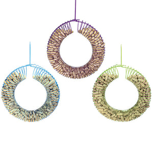 Wreath Peanut Feeder with circular design, filled with whole peanuts. Features spring-form coils for easy bird clinging. Holds up to 1.5 lbs. of peanuts.