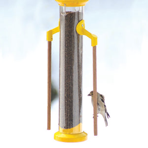 Finch Tube Feeder with Wood Dowel Perches: A bird perches on a bright yellow feeder, showcasing multiple feeding holes and a metal hanger.