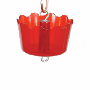 Red Ant Guard, a plastic container with a metal hook, designed to keep ants out of nectar feeders by creating a water barrier.