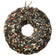 Le Petit Mini Seed Wreath: A bird-feed ring with compressed seeds and nuts, hung by twine, perfect for attracting various birds year-round.