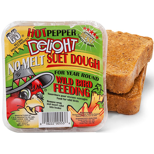 Hot Pepper Delight Suet Cakes close-up, showing brown suet with visible red pepper bits in packaging. Ideal for bird feeders, deters squirrels, set of 4 or 12.