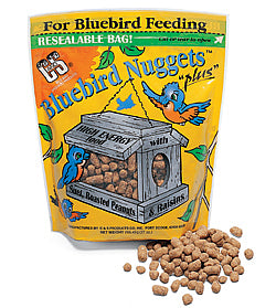 Bluebird Nuggets, a yellow bag with a bluebird image, containing a blend of beef suet, peanuts, corn, and raisins, attracting various bird species.