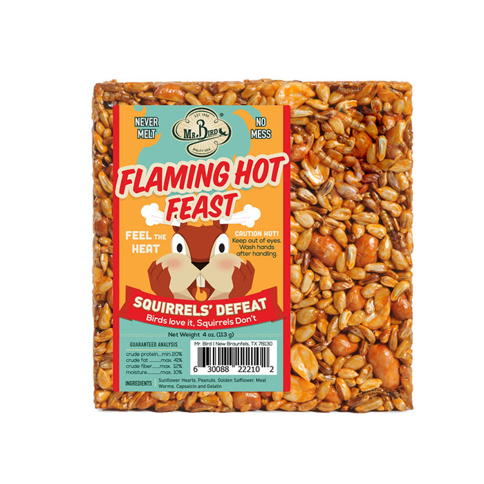 Flaming Hot Feast Block Small, Set of 3: Square food packages with a cartoon squirrel label, designed to attract birds and deter squirrels using spicy-hot ingredients.