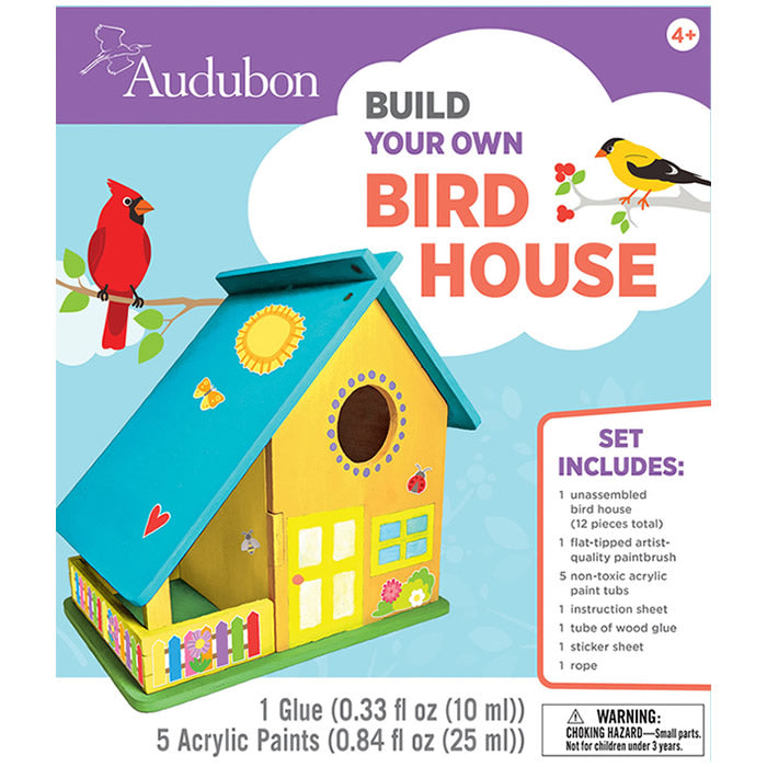 Audubon Bird House Buildable Wood Paint Kit with unassembled birdhouse, acrylic paints, varnish, glue, string, paintbrush, sticker sheet, and instructions in a box.