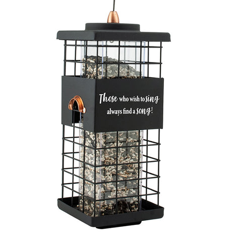 Modern Farmhouse Caged Tube Feeder with motivational quote, wire hanger, and four ports. Square-shaped, squirrel-resistant design with metal grid and refillable seed tube.