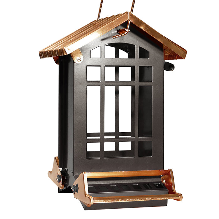 Chateau Mini Absolute® Squirrel Resistant Feeder, featuring a bird feeder with clear plastic windows, weight-activated perches, and a lockable roof, designed to deter squirrels.