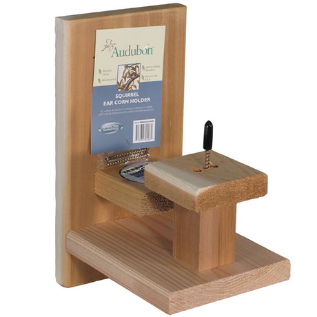 Squirrel Chair Feeder: Cedar wooden feeder with a central hole for mounting a corn cob, designed to attract and entertain squirrels. Measures 8 x 5-1/2 x 9-3/4 inches.