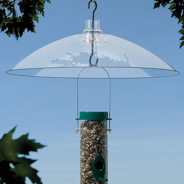 Hanging or Pole Mount Baffle displayed from a hook, designed to protect bird feeders from squirrels. Features UV-resistant plastic and fits poles 1-1 3/8 inches in diameter.