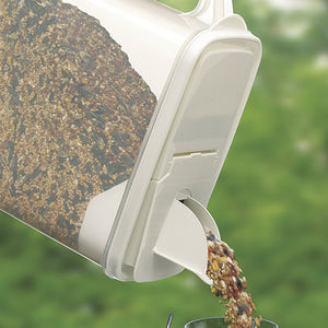 Close-up of the Seed Storage Container with Dual-Pour spout, showing easy-to-fill design for birdseed, pet food, or cereal. Holds up to 10 lbs.