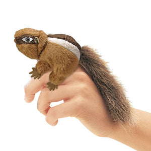 Hand holding a Folkmanis Mini Critter Finger Puppet, a lifelike squirrel, perfect for imaginative play and adventures.