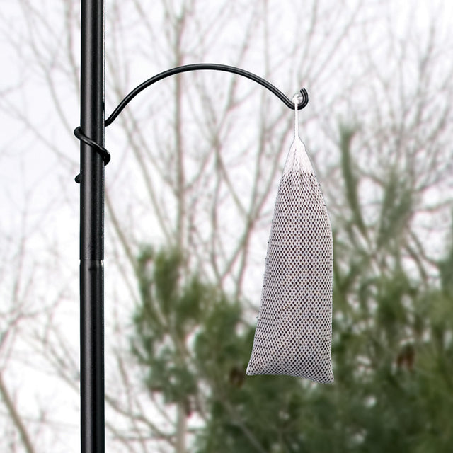 Quick Connect Coil Arm Hanger, 8 inches, attached to a pole, designed to hold lightweight bird feeders like a Nyjer® sock.