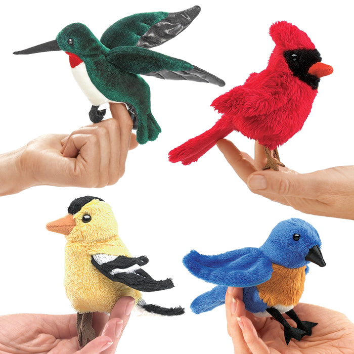 Folkmanis Mini Songbird Puppets: Multiple hands holding various soft, finger-sized bird puppets, perfect for kids.