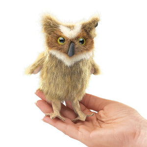 Hand holding a Folkmanis Mini Owl Finger Puppet, designed to resemble a natural owl, perfect for imaginative play and adventures.