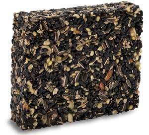 Duncraft Chickadee Block, Set of 2; close-up of square seed blocks with nuts and sunflower seeds, ideal for ground or platform feeders.