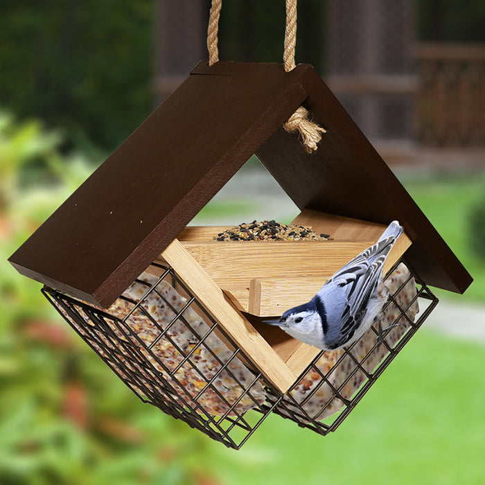 Ultimate Renewable® BAMBOO Double Suet Feeder with a bird perched, featuring two suet cages and a mini platform feeder, hanging outdoors.