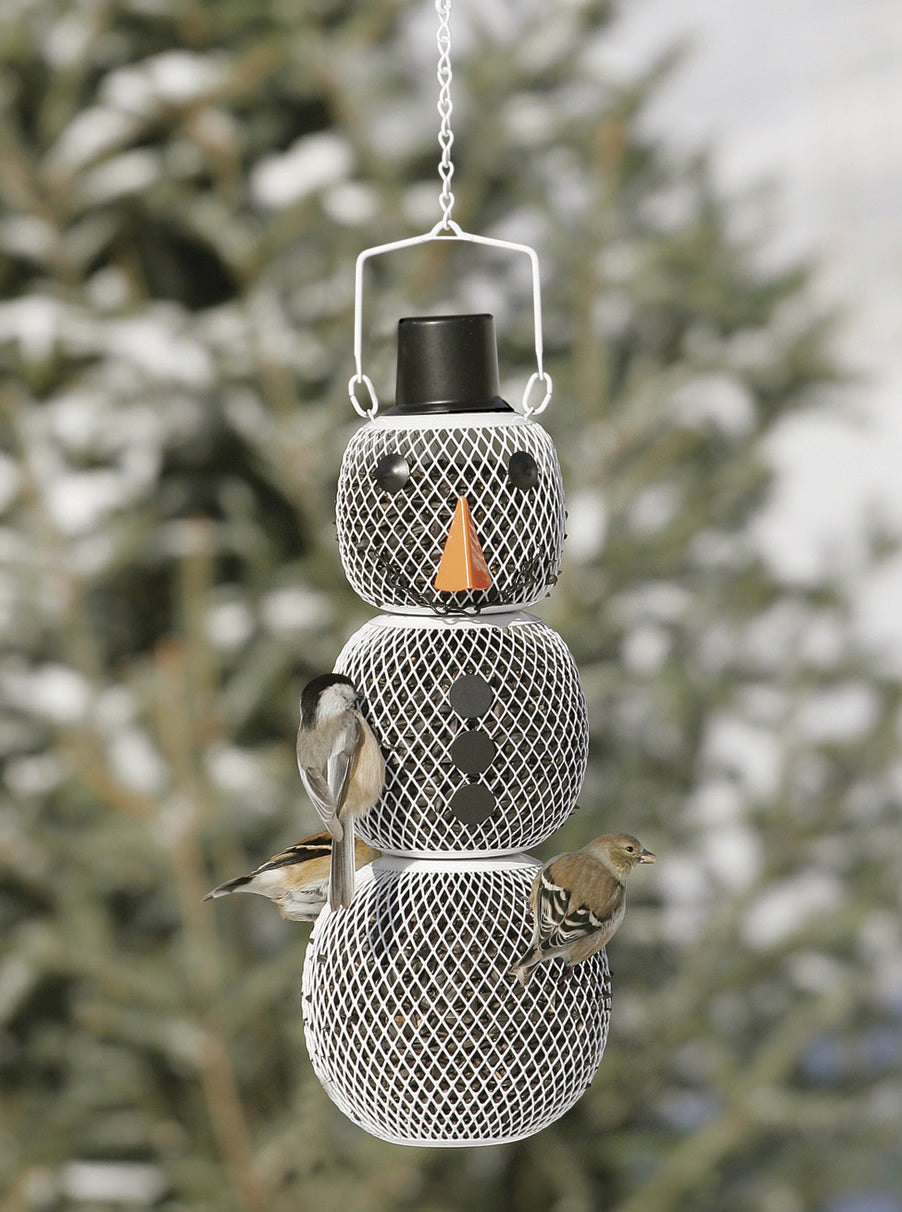 Snowman bird feeder with birds perched on it, featuring a mesh body, carrot nose, button eyes, and a top-hat for filling with seeds.