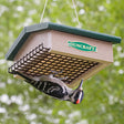 Duncraft Eco-Strong Upside Down Suet feeder with a woodpecker feeding on the bottom grid. Durable, easy-to-clean, and perfect for attracting woodpeckers.