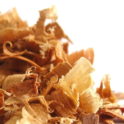 Cedar shavings for birdhouses, shown in a close-up pile, provide natural insect repellent and moisture absorption, ideal for nesting birds and squirrels.