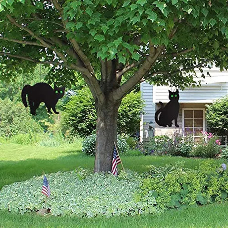 Garden Scare Cats with Reflective Eyes, Set of 4, featuring lifelike cat silhouettes designed to deter pests, ideal for protecting gardens from unwanted animals.