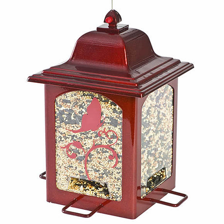 Sparkle Lantern Feeder with U-shaped perches, filled with bird seed. Clear hopper for seed visibility and Sure-Lock™ cap for secure closure.