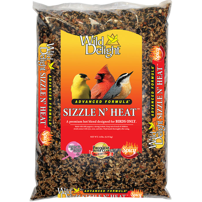 Wild Delight Sizzle N' Heat Bird Seed, 14 lbs. bag, featuring a mix of sunflower kernels, peanuts, and spicy chili peppers, repelling squirrels while attracting birds.