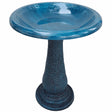 Navy Blue Fiber Clay Bird Bath with pedestal, full-sized basin, and bird perched on the rim. Lightweight, easy to clean, and ideal for attracting birds.