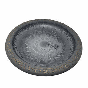 Dove gray fiber clay birdbath bowl with embossed vine border, angled view