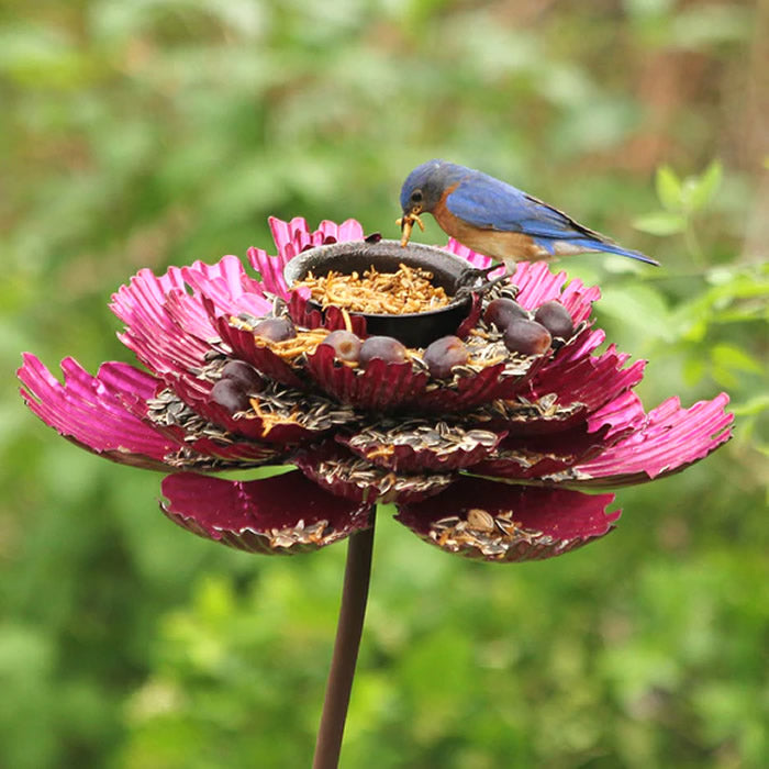 Pink Parfait Peony Bird Feeder with a bird eating from the flower, featuring a durable, all-metal design and a removable center bowl for bird seed.