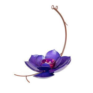 Purple Prince Magnolia Bird Feeder, featuring purple flower petals and a central dish for jelly, with a candle holder-like design for attracting orioles.