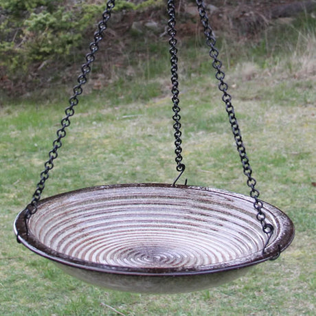 Hanging Circles Bird Bath in Sandy Granite, featuring a stoneware basin with concentric circles, suspended by a 34-inch chain.