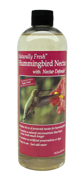 Close-up of the Naturally Fresh Hummingbird Nectar Concentrate bottle with a label featuring a hummingbird and flower. 16 oz. bottle makes 64 oz. of nectar.