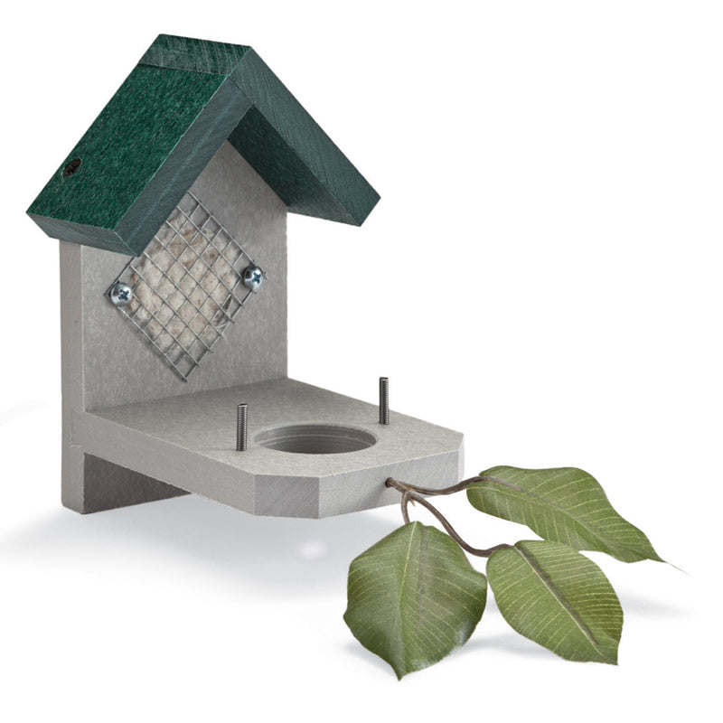 Duncraft Original Hummingbird Nester with green roof, metal posts, and leaf-adorned landing branch for secure nesting. Includes natural cotton nesting material behind wire mesh.