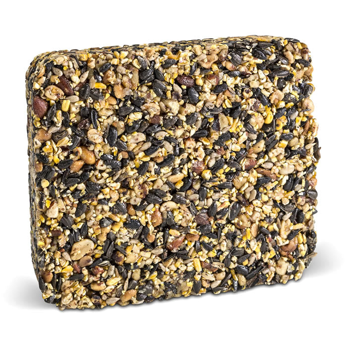 Woodpecker Seed Cake: A block of mixed grains including peanuts, almonds, cracked corn, sunflower hearts, and black oil sunflower seed, shaped for easy bird feeding.