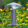 Finch Mesh Tube with Weather Dome and Tray, featuring a group of birds feeding on a metal mesh feeder with a protective weather dome and tray.